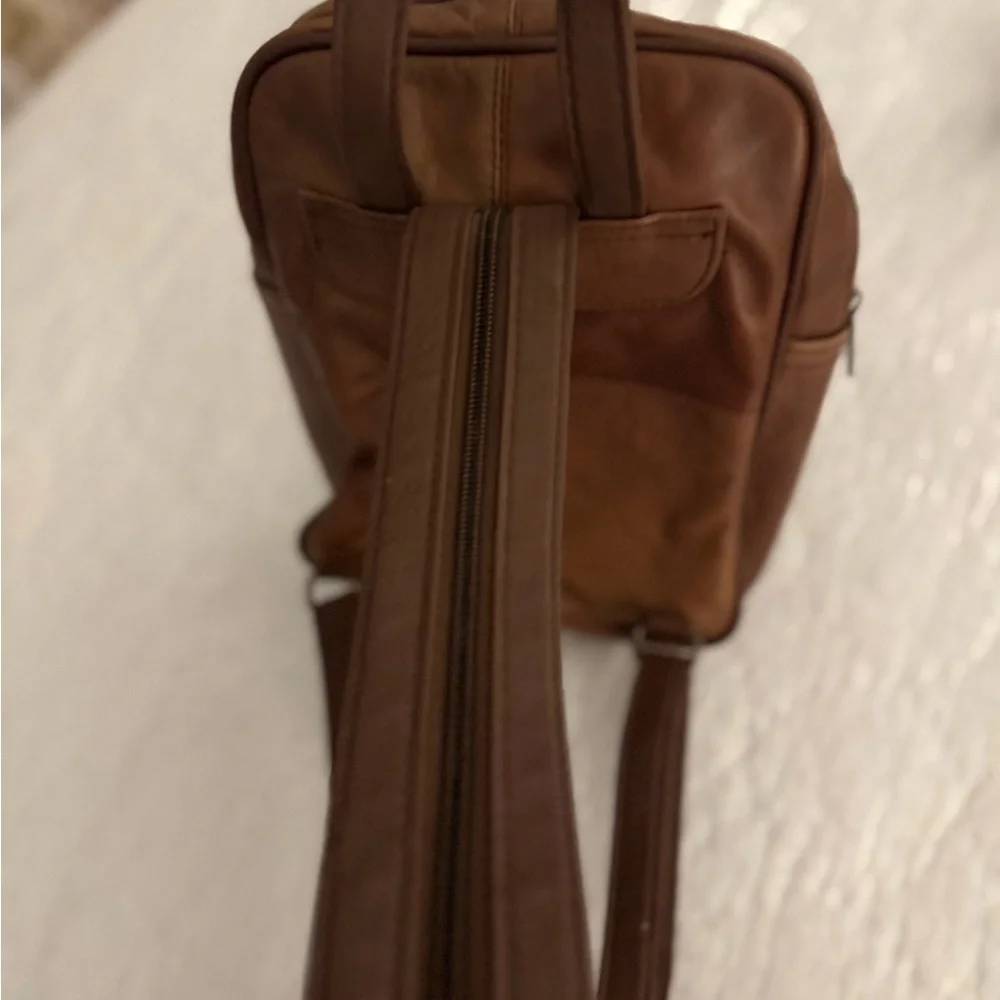C bags leather backpack can also be shoulder bag. Tan